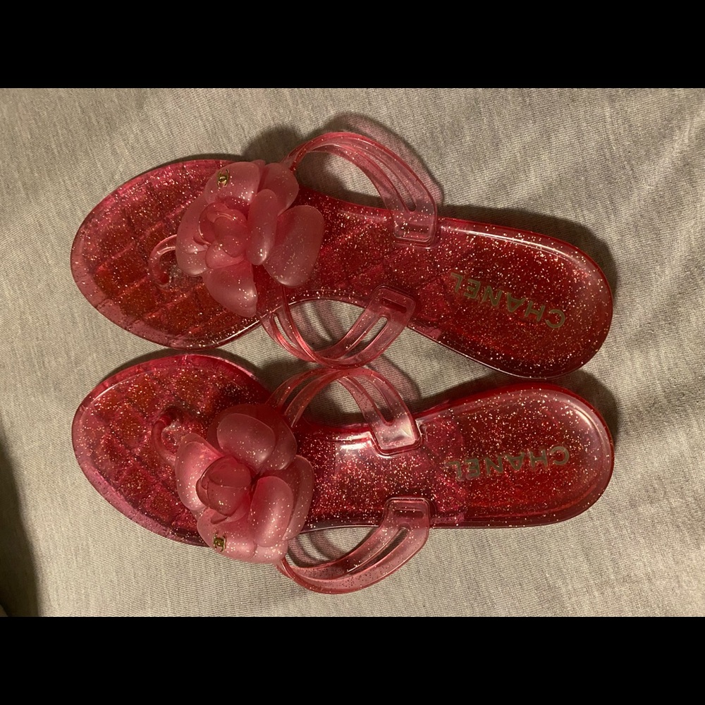 Slightly used Chanel jelly pink glitter flip flops
